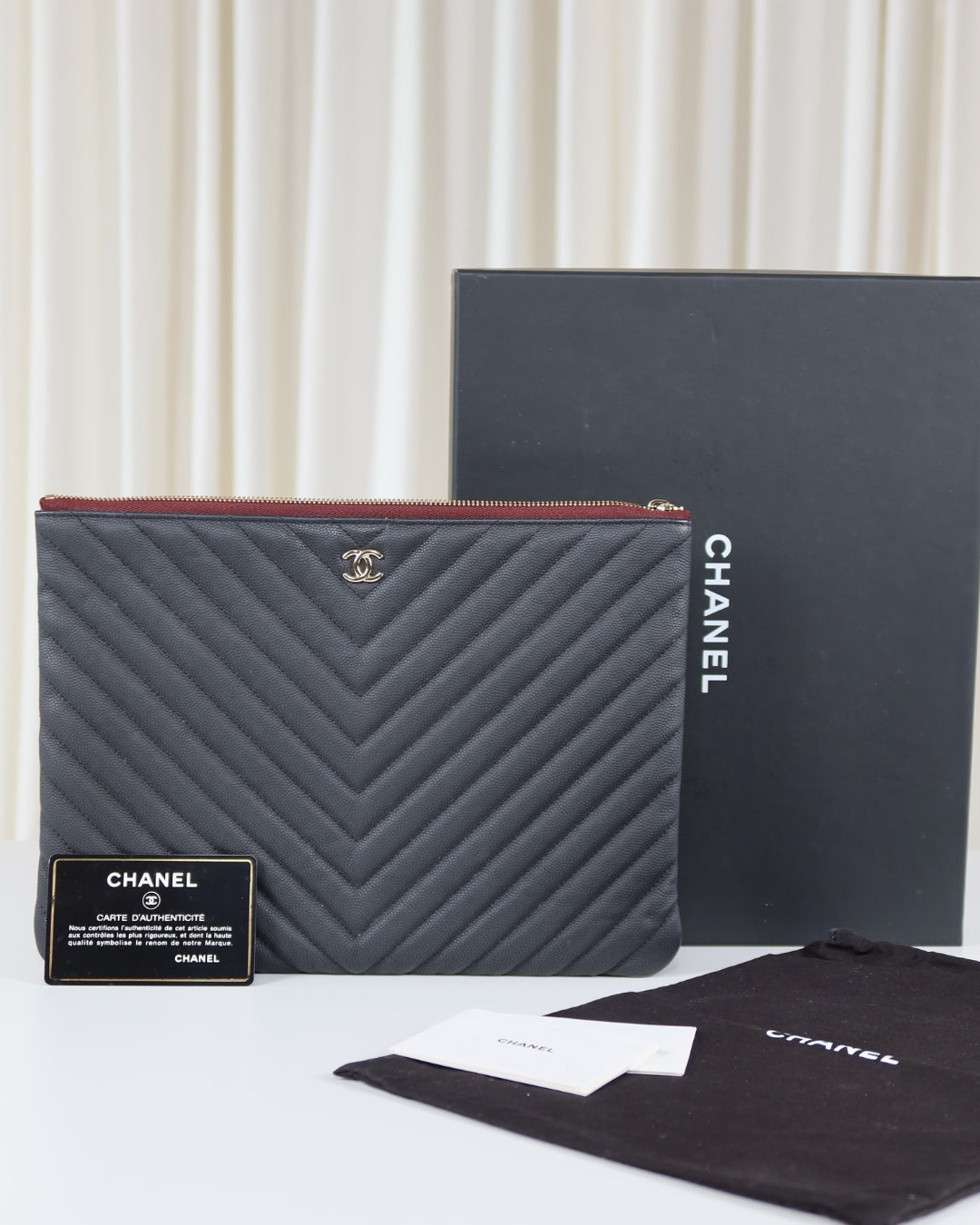 Chanel O Case Chevron Caviar Leather