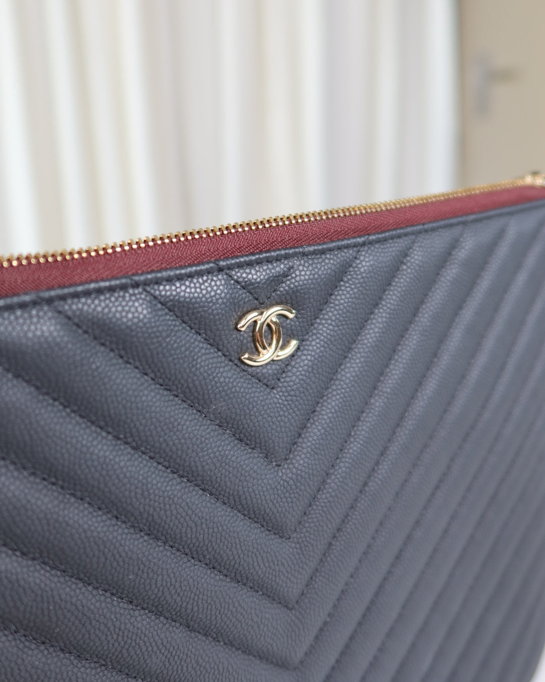 Chanel O Case Chevron Caviar Leather
