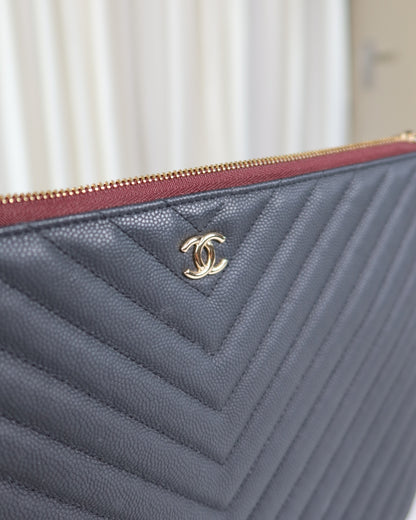 Chanel O Case Chevron Caviar Leather
